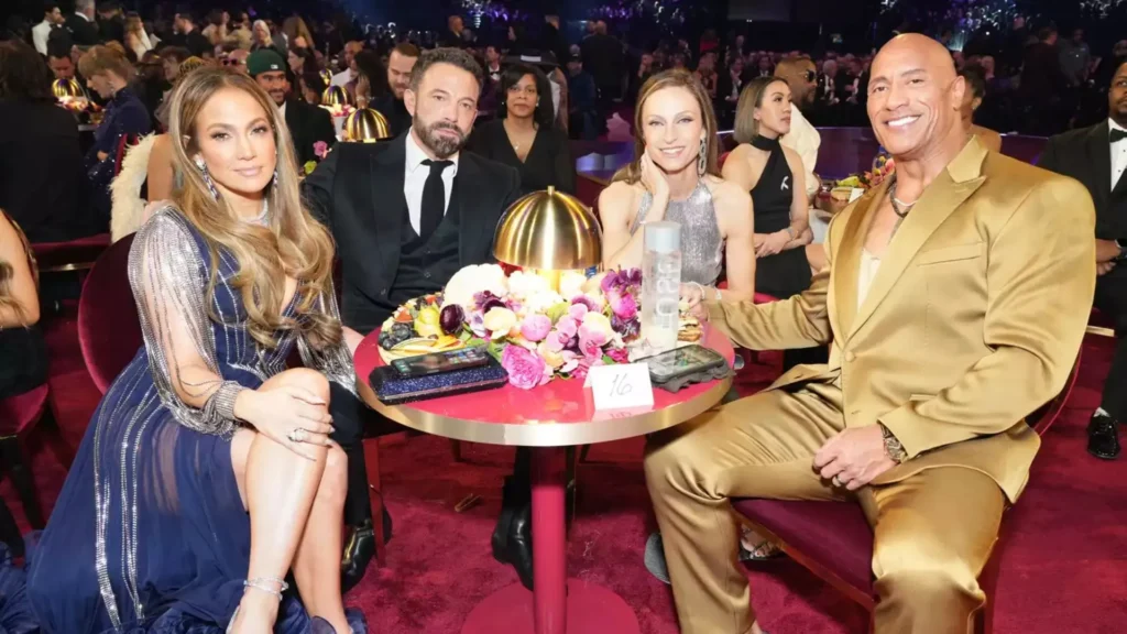 Lopez and her husband Ben Affleck with Dwayne Johnson and his wife Lauren Hashian (Image credit: Kevin Mazur\Getty)